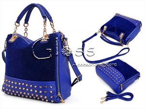 CARTERA CON TACHAS