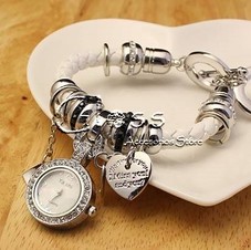 RELOJ -PULSERA BLANCO CON DIJES